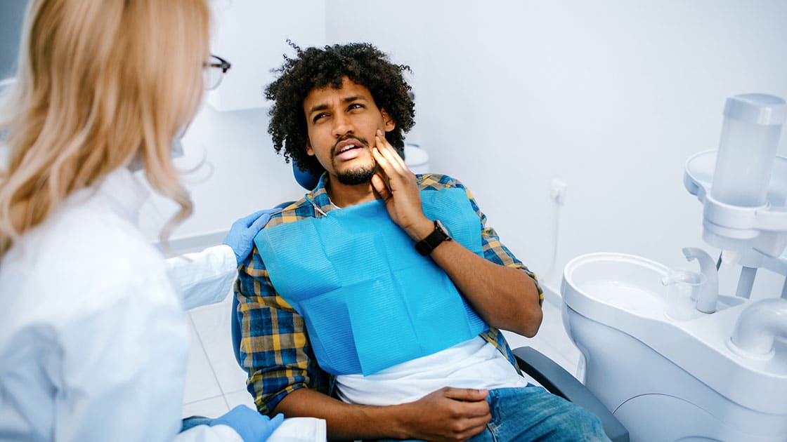 Happy patient showing a bright smile